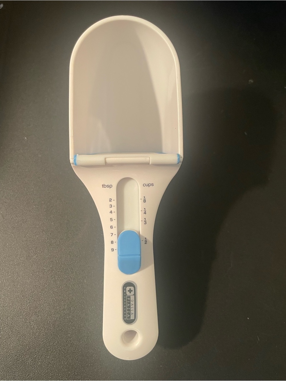 Adjustable White and Light Blue Measuring Scoop